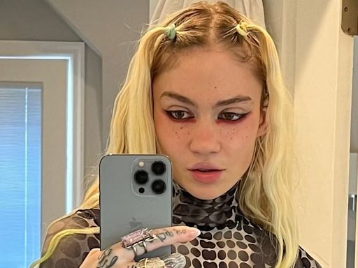 Grimes picks side in Elon Musk's online war with trans daughter Vivian