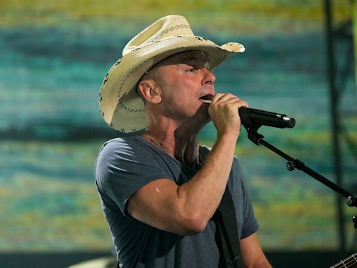 Kenny Chesney 'devastated' after woman falls off escalator and dies at the end of his concert