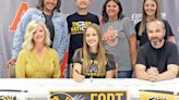 Gracie Hylton sign to cheer at Fort Hays
