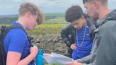 Oldham teenagers battle heavy rain and winds to complete DofE bronze awards in a school first