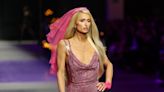 Paris Hilton closes Versace’s Milan Fashion Week show in signature pink