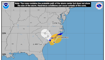 Storm off Carolinas weakening, but lashing coast with wind, rain, flash flooding