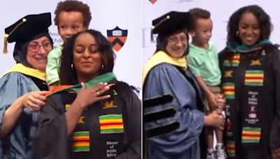 Graduating mom gets master's hood from 3-year-old son: 'I hope he never forgets it'