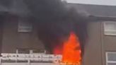 Hero pulls man from burning Glasgow flat as flames burst from windows