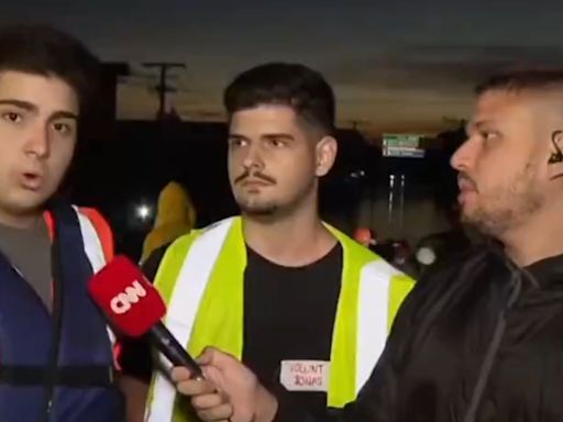 Ao vivo na CNN, homem grita 'Globo lixo' e leva bronca de repórter