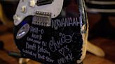 A battered guitar which Nirvana's Kurt Cobain gifted to his friend Mark Lanegan sells at auction for almost $600,000