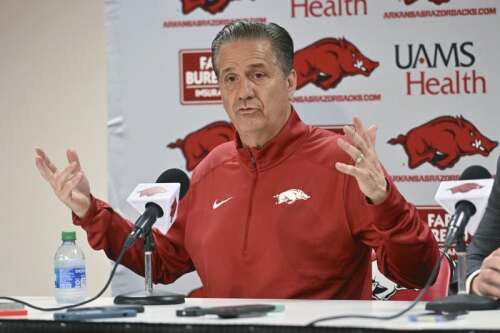 Arkansas hires John Calipari to coach the Razorbacks, a day after stepping down from Kentucky