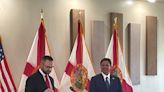 Gov. Ron DeSantis visits Umatilla bearing gifts and honoring a WW II veteran