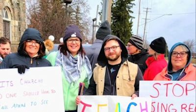 Catholic priest resigns amid protests over his apology for gay author’s presence at school