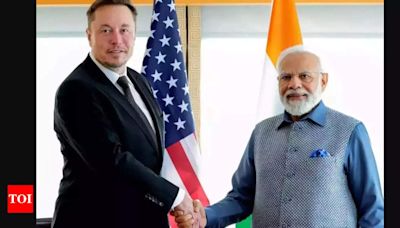 Tesla CEO Elon Musk congratulates PM Narendra Modi on becoming the world's most-followed leader on X | - Times of India