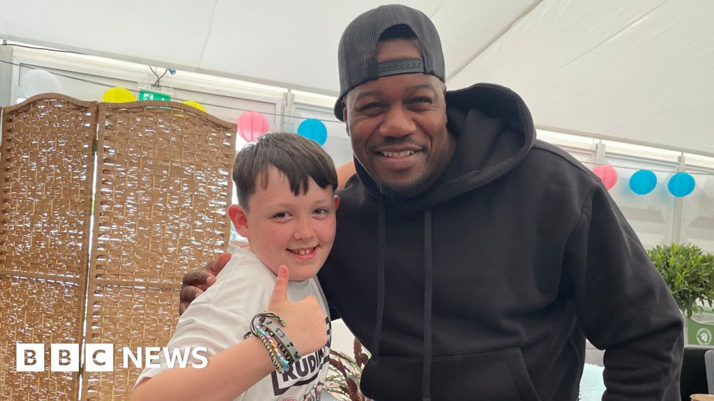 Rudimental's Locksmith meets 10-year-old carer at festival