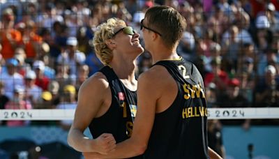 Women's champions knocked out of Olympic beach volleyball in nail-biting finish