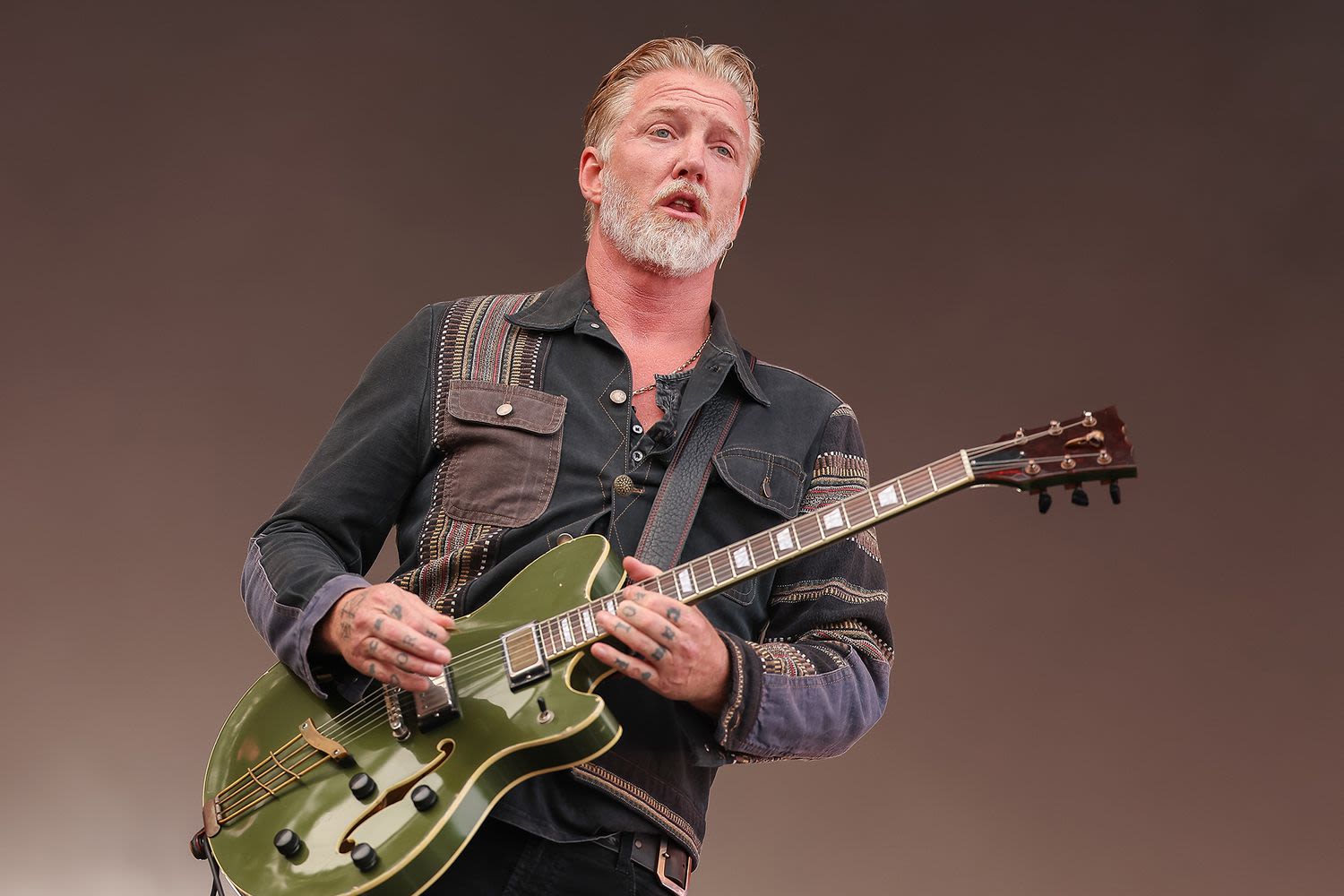 Queens of the Stone Age frontman Josh Homme is having emergency surgery, band canceling tour dates