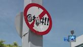 Virginia Beach’s infamous ‘no cursing’ signs being donated to police charity