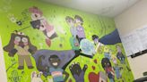 Rural Mich. school may lose health center after controversy over mural with LGBTQ+ symbolism