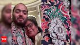 Anant Ambani wore a brooch with Dhirubhai Ambani's picture at his wedding reception - Times of India