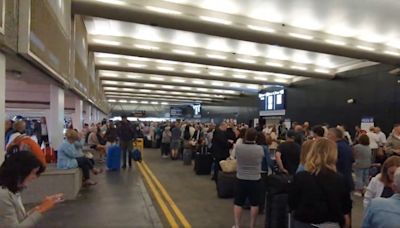 Travel chaos at Manchester Airport after major power cut halts all flights at two terminals