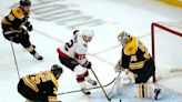 Ullmark's 40 saves carries Bruins past Senators, 2-1