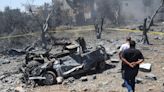 Lebanon’s Hezbollah fires dozens of rockets at Israeli kibbutz after drone strike wounds civilians