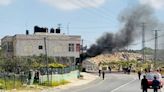 Hundreds of Israeli settlers attack Palestinian villages in the occupied West Bank after missing Israeli boy found dead