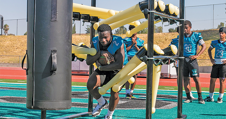 Wolverines finally set foot on new turf