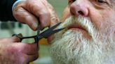 French barber still trimming at 90