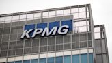 KPMG freezes pay for 12,000 employees amid market downturn