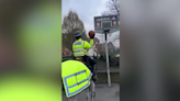 One-trick pony: Police officer plays basketball while riding horse