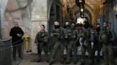Israeli police raid Muslim mosque, leading to confrontation amid religious holidays