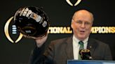 College Football Playoff executive director Bill Hancock will retire in February 2025