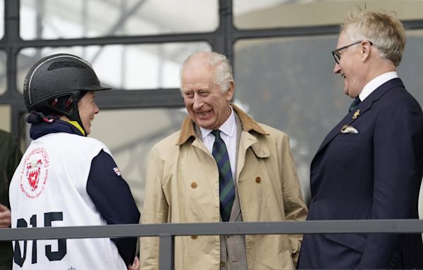 King smiles on visit to Queen Elizabeth II’s favourite horse show as he resumes public duties