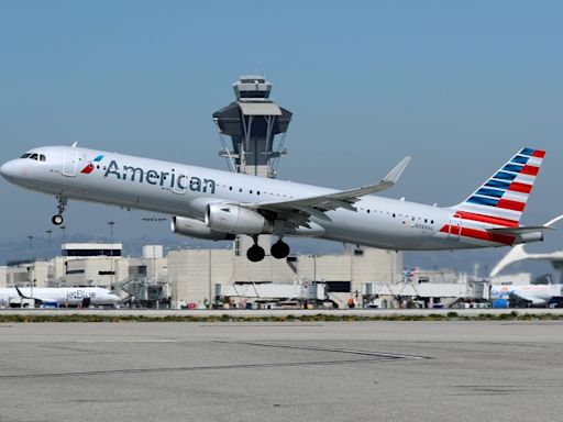 American Airlines cuts annual profit forecast on pricing pressures
