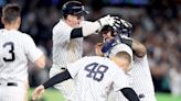 Aaron Judge just misses home run No. 61, Yankees clinch playoff spot with walk-off win