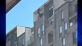 Firefighters scramble into action after window washer left dangling from side of Brookline building