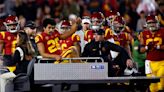 Fans and media members react to former Duck Travis Dye’s season-ending injury with USC