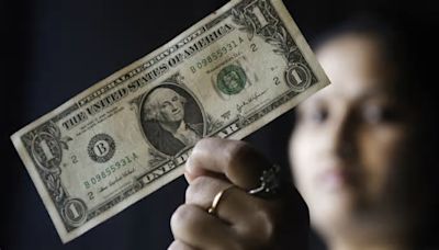 Hawkish Federal Reserve lifts dollar, weakens rand