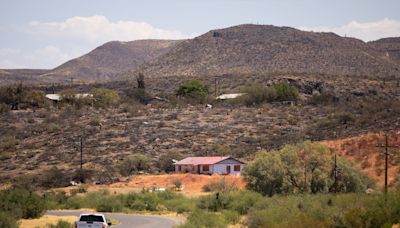 Man arrested on arson charge after Arizona wildfire destroyed 21 homes, caused evacuations