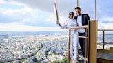 JO de Paris : la flamme olympique portée en haut de la Tour Eiffel par Clarisse Agbégnénou