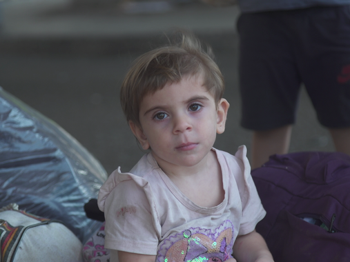 'I tell them it's fireworks': Families in Lebanon try to reassure children on the patches of grass they now call home