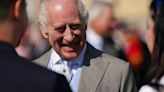 Charles beams alongside Royal Family at Buckingham Palace Garden party