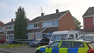 'The street was quiet then full of police': Residents in shock after deaths spark murder probe