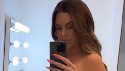 Lala Kent poses nude as she shows off her blossoming baby bump