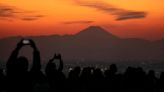 Japan, famously polite, struggles to cope with influx of tourists