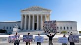 Supreme Court strikes down New York gun law along ideological lines