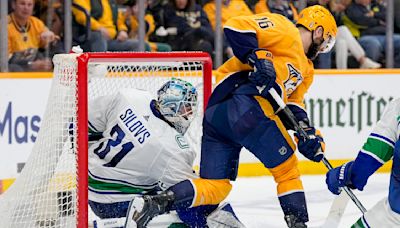 Canucks advance to 2nd round, beating Predators 1-0 in Game 6 on Pius Suter's late goal