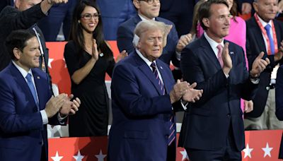 Trump walks into the Republican convention to 'It's Man's World'