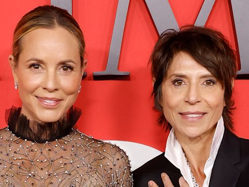 Maria Bello, 56, and star chef Dominique Crenn pose with wedding rings