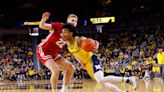 Wisconsin's NCAA Tournament hopes continue to fade as Badgers fall in overtime to Michigan; Chucky Hepburn injures knee