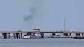 Barge hits bridge connecting Galveston and Pelican Island, causing partial collapse and oil spill