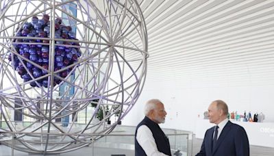 Russia talks up business with India as Modi visits Moscow